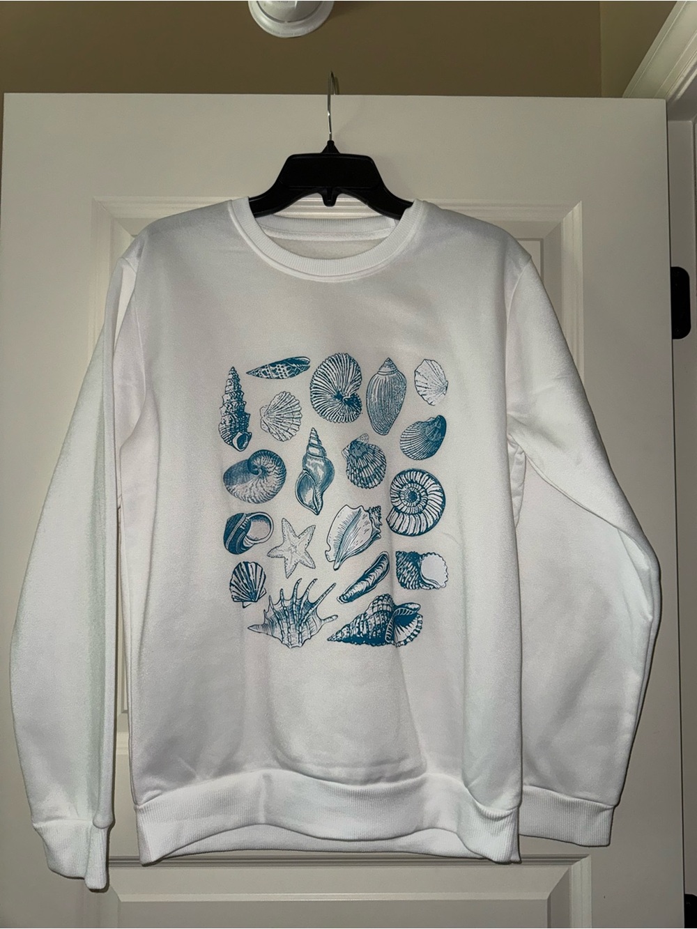 White Crewneck Sweatshirt with Blue Shell Print